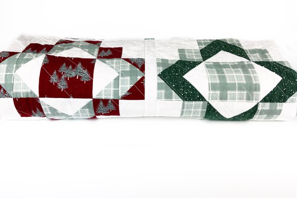 Framed Folk Quilt in Christmas fabrics
